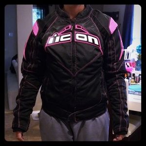 Icon women's motorcycle jacket, black and pink